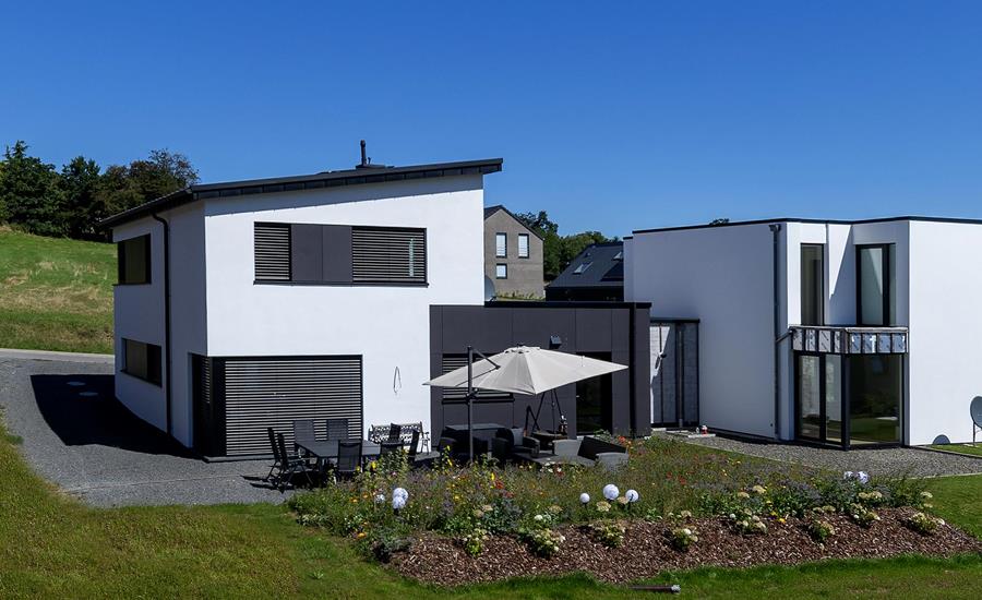 Construction d'une maison individuelle attenante à une maison existante