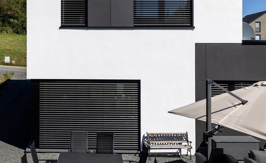 Construction d'une maison individuelle attenante à une maison existante