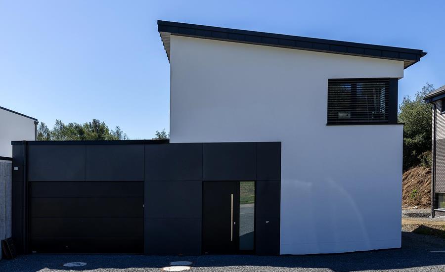 Construction d'une maison individuelle attenante à une maison existante