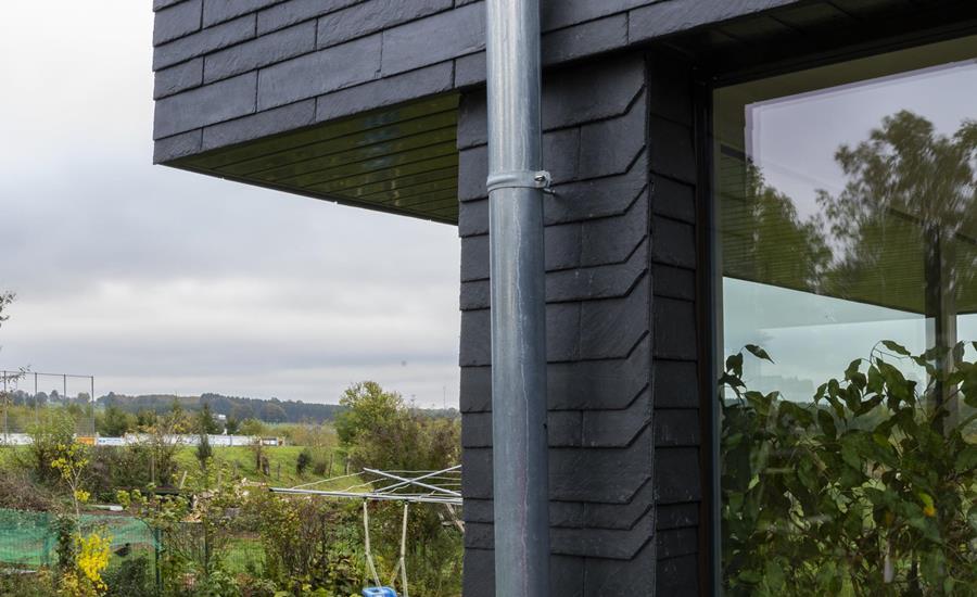 Extension d'une véranda, complétée par la création d'une terrasse