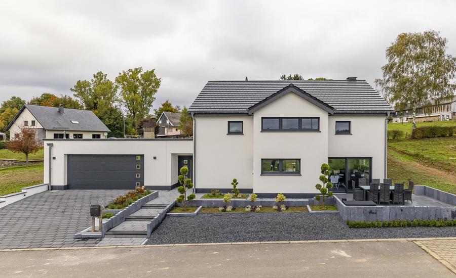 Construction d'une maison unifamiliale avec toit plat