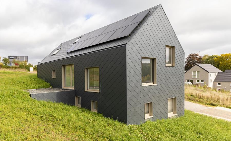 Construction clé en main d'une maison individuelle avec façade en Eternit