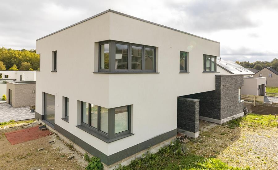 Construction d'une maison unifamiliale avec pierres de taille