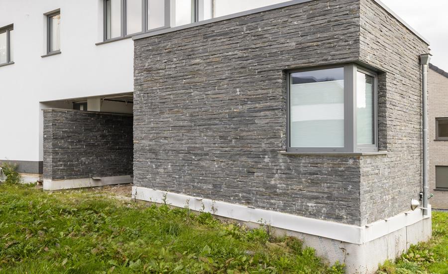 Construction d'une maison unifamiliale avec pierres de taille