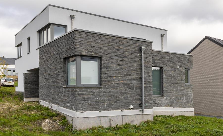 Construction d'une maison unifamiliale avec pierres de taille