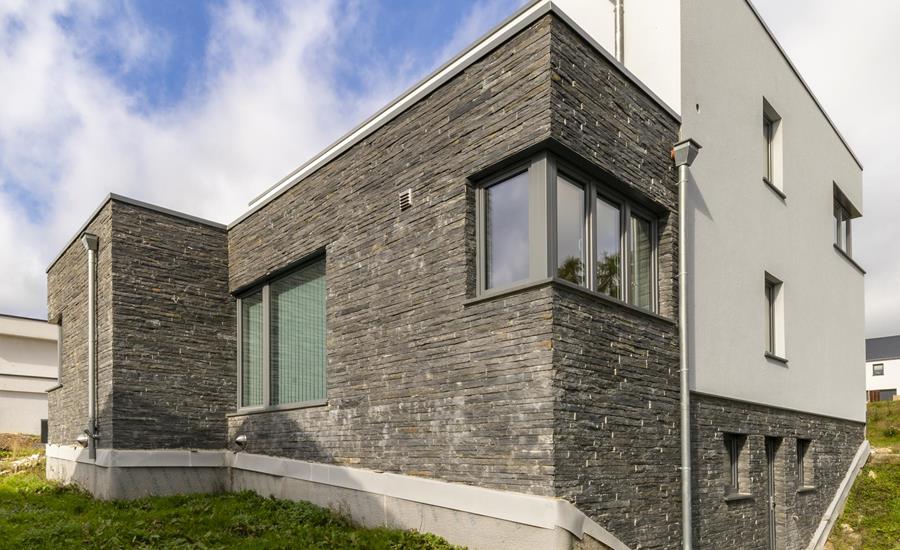 Construction d'une maison unifamiliale avec pierres de taille