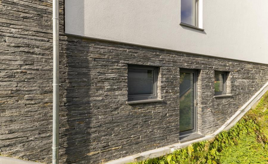 Construction d'une maison unifamiliale avec pierres de taille